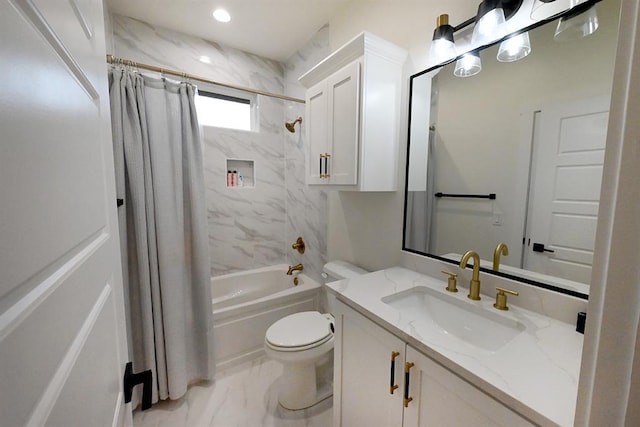 bathroom featuring vanity, toilet, shower / bath combo, and marble finish floor
