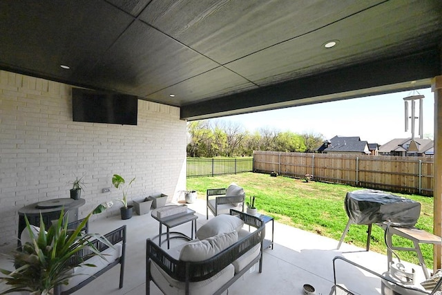 view of patio / terrace with a fenced backyard and an outdoor hangout area