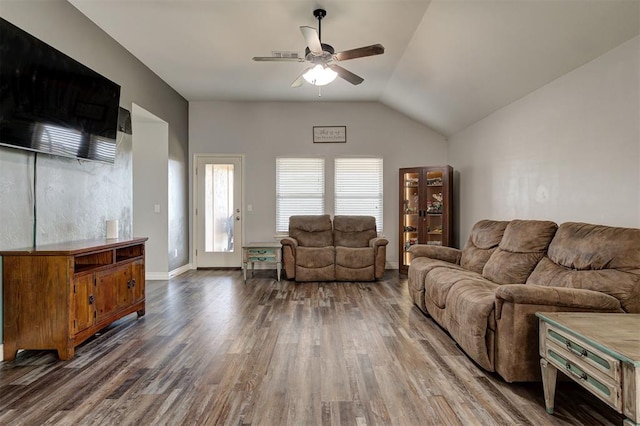 living room with a ceiling fan, wood finished floors, and lofted ceiling