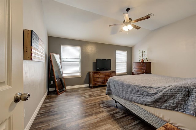 bedroom featuring a ceiling fan, baseboards, wood finished floors, and lofted ceiling