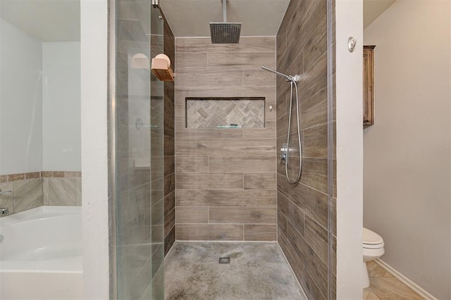 full bathroom featuring a stall shower, toilet, and a bath