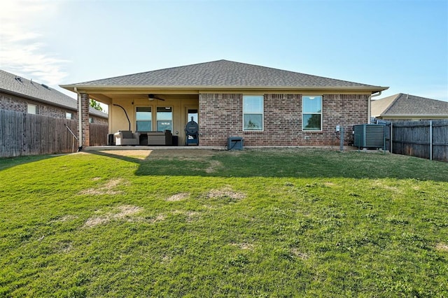 rear view of property with a ceiling fan, cooling unit, a fenced backyard, a patio, and outdoor lounge area