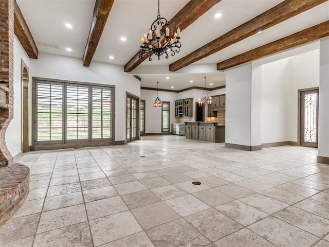 unfurnished living room with recessed lighting, a chandelier, and beamed ceiling