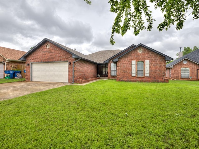 ranch-style home with driveway, brick siding, a front lawn, an attached garage, and a shingled roof