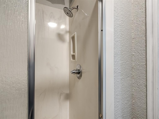 room details featuring a stall shower
