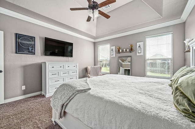 carpeted bedroom featuring visible vents, baseboards, crown molding, and multiple windows