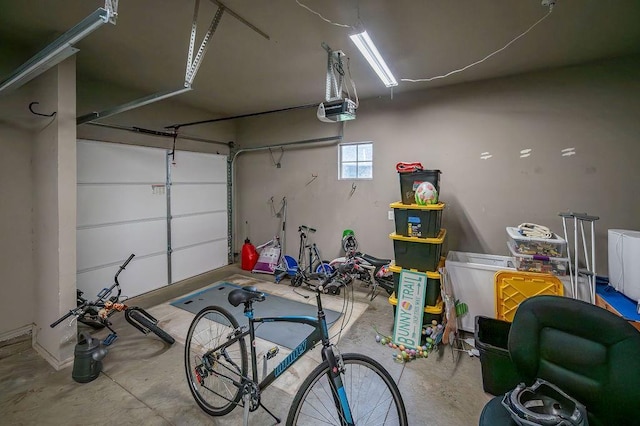garage featuring a garage door opener