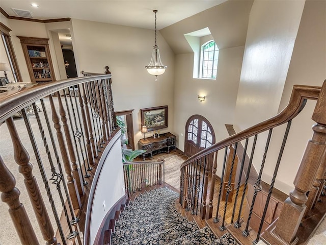 3125 Cumberland Dr, Edmond, OK 73034 - staircase with wood finished floors and high vaulted ceiling