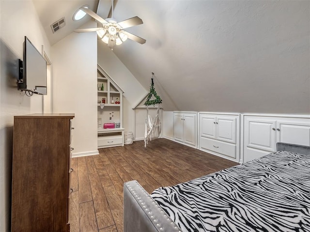 3125 Cumberland Dr, Edmond, OK 73034 - bedroom featuring lofted ceiling, dark wood-type flooring, baseboards, and ceiling fan