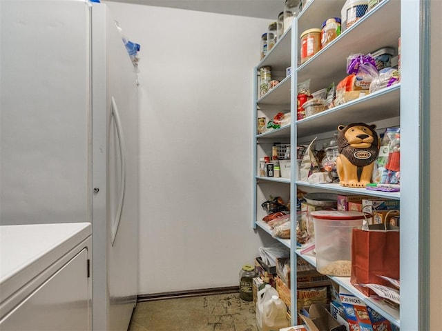 pantry with separate washer and dryer