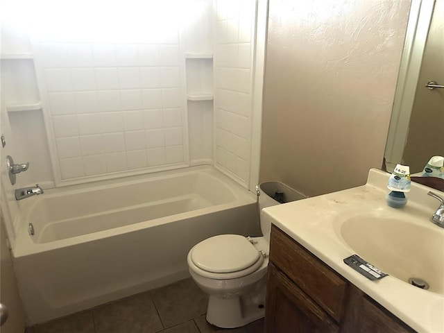 bathroom featuring toilet, tile patterned floors, shower / tub combination, and vanity