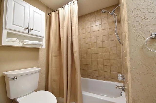 1904 NW Euclid Ave, Lawton, OK 73507 - full bath featuring toilet, a textured wall, and shower / bath combo