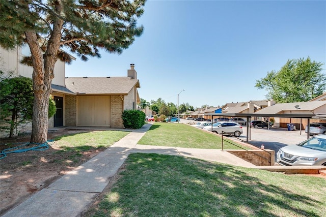 view of yard featuring a residential view