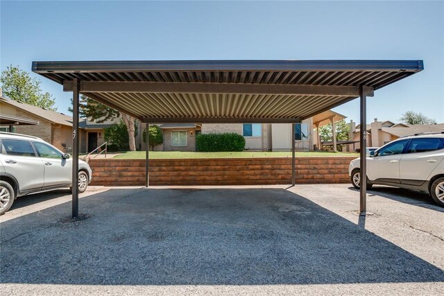 view of partially covered parking lot