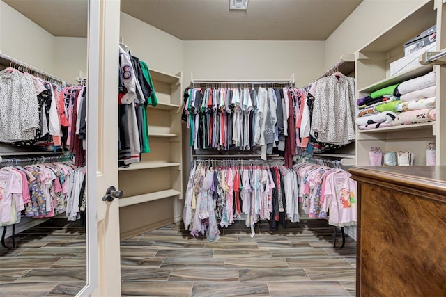 spacious closet with visible vents