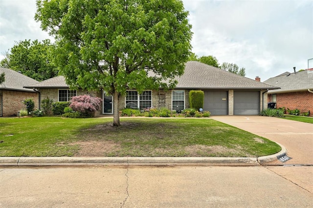 ranch-style home featuring brick siding, driveway, a front lawn, and a garage