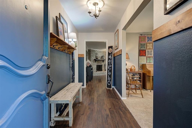 interior space featuring baseboards and wood finished floors