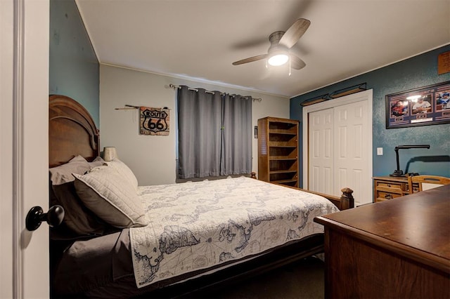 bedroom with ceiling fan and a closet