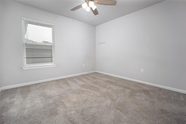 1208 Hickory Creek Dr, Yukon, OK 73099 - unfurnished room with baseboards, carpet flooring, and a ceiling fan