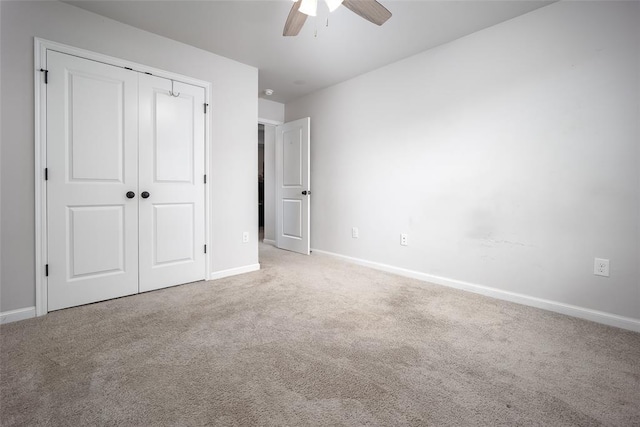1208 Hickory Creek Dr, Yukon, OK 73099 - unfurnished bedroom featuring ceiling fan, carpet, baseboards, and a closet