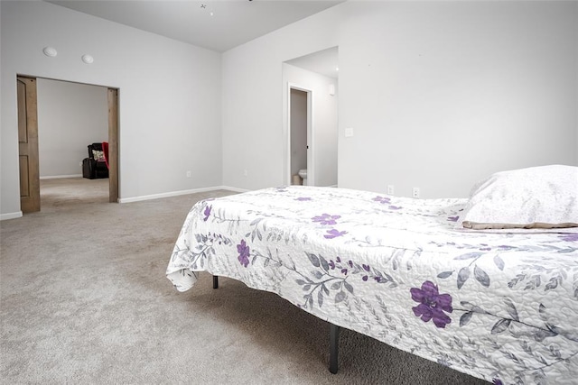 1208 Hickory Creek Dr, Yukon, OK 73099 - carpeted bedroom featuring baseboards