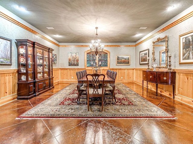 3812 Ridgeline Dr, Norman, OK 73072 - dining area with an inviting chandelier, ornamental molding, and a wainscoted wall