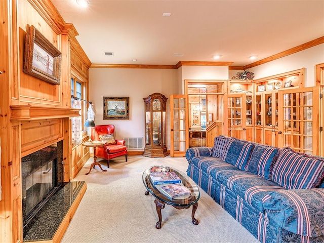 3812 Ridgeline Dr, Norman, OK 73072 - carpeted living room featuring crown molding, visible vents, french doors, and a high end fireplace