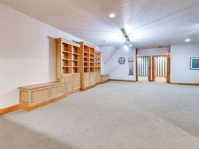 3812 Ridgeline Dr, Norman, OK 73072 - interior space featuring light carpet, a textured ceiling, and baseboards