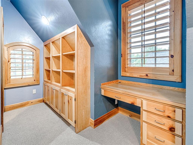 3812 Ridgeline Dr, Norman, OK 73072 - interior space featuring a textured wall, carpet floors, and baseboards