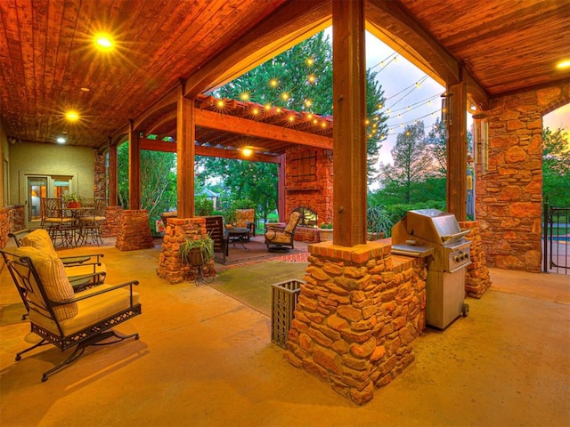 3812 Ridgeline Dr, Norman, OK 73072 - view of patio with outdoor dining space, an outdoor stone fireplace, area for grilling, and grilling area
