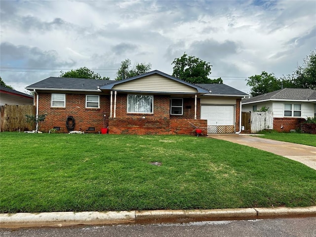 ranch-style home featuring driveway, a garage, brick siding, fence, and a front lawn