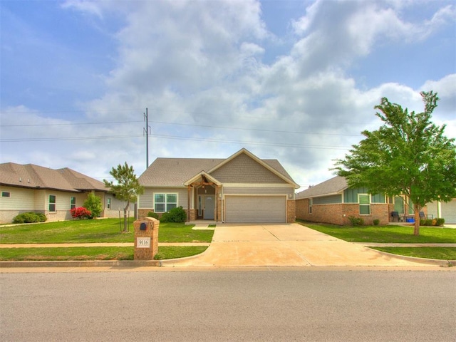 ranch-style house featuring a garage, a front yard, driveway, and brick siding