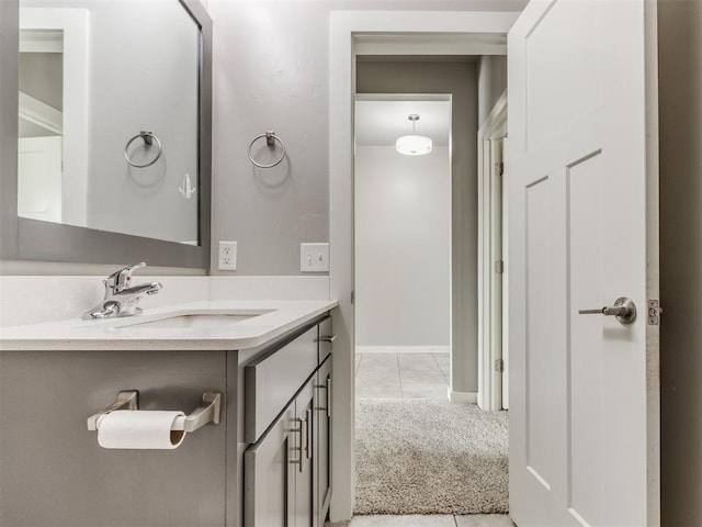 bathroom with vanity and tile patterned flooring