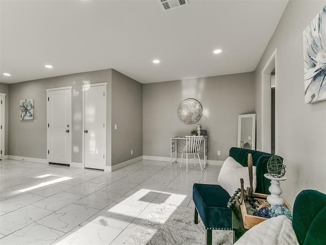 sitting room with recessed lighting, baseboards, visible vents, and marble finish floor