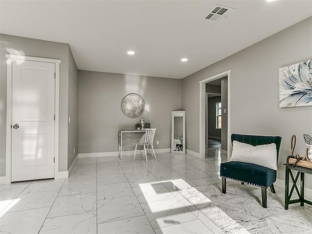 sitting room with baseboards, marble finish floor, recessed lighting, and visible vents