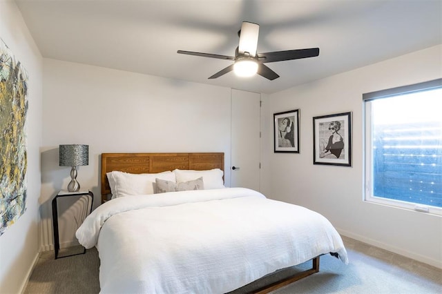 1216 W Wilshire Blvd, Nichols Hills, OK 73116 - carpeted bedroom with baseboards and ceiling fan