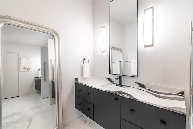 1216 W Wilshire Blvd, Nichols Hills, OK 73116 - bathroom featuring marble finish flooring and vanity
