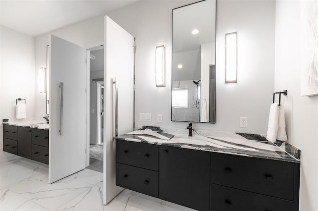 1216 W Wilshire Blvd, Nichols Hills, OK 73116 - full bath with two vanities, marble finish flooring, and a marble finish shower