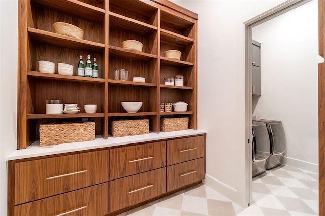 2826 Guilford Ln, Oklahoma City, OK 73120 - walk in closet featuring light floors and washer and clothes dryer