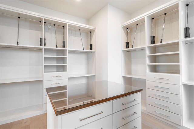 2826 Guilford Ln, Oklahoma City, OK 73120 - spacious closet featuring light wood-type flooring