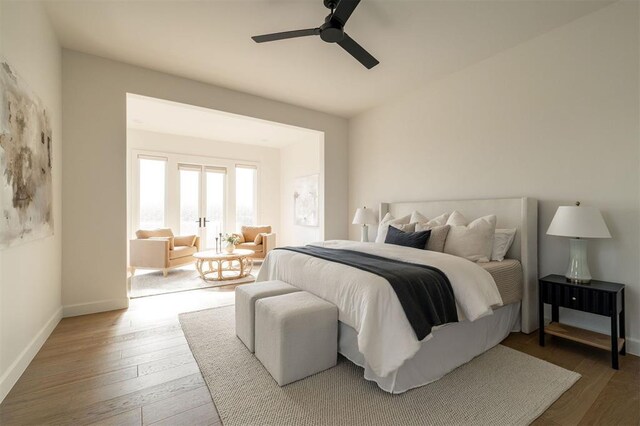 2826 Guilford Ln, Oklahoma City, OK 73120 - bedroom featuring wood-type flooring, baseboards, and ceiling fan