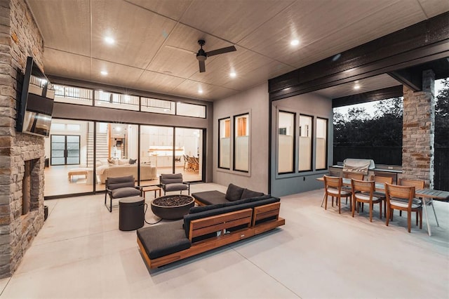 2826 Guilford Ln, Oklahoma City, OK 73120 - view of patio with an outdoor hangout area, outdoor dining space, a ceiling fan, and an outdoor kitchen