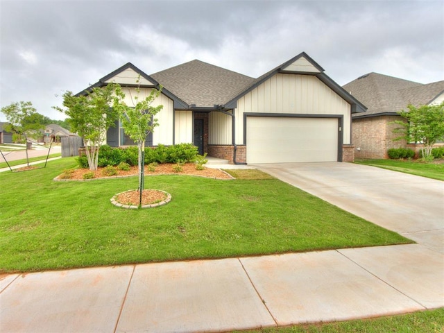 view of front of house featuring a shingled roof, an attached garage, board and batten siding, a front yard, and driveway