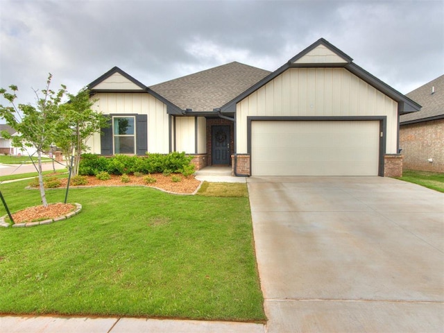 single story home with driveway, a front yard, roof with shingles, brick siding, and an attached garage