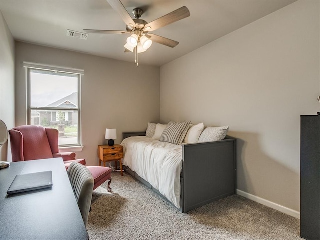 bedroom featuring baseboards, ceiling fan, carpet, and visible vents