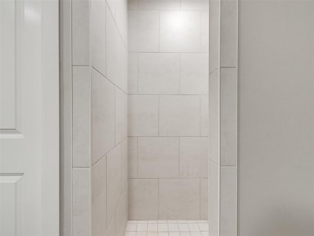 room details with a tile shower