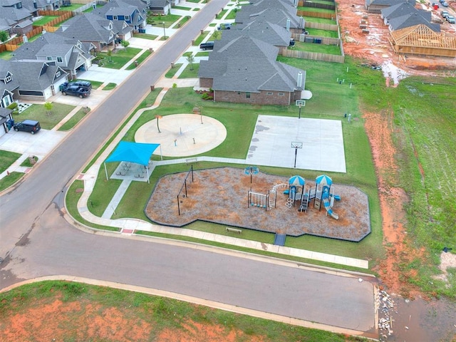 birds eye view of property with a residential view