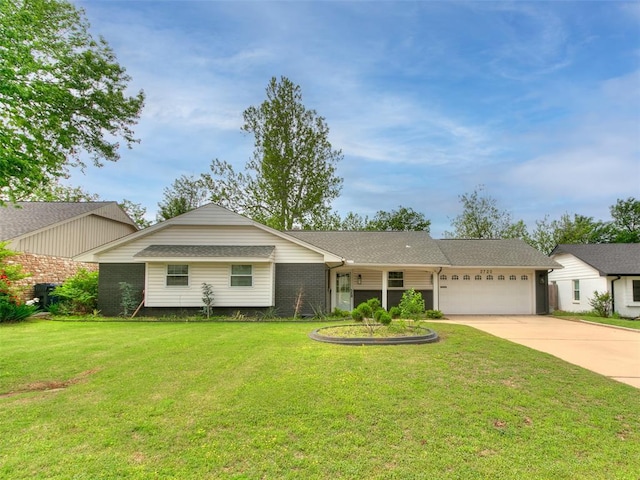 ranch-style home with an attached garage, driveway, a front lawn, and brick siding