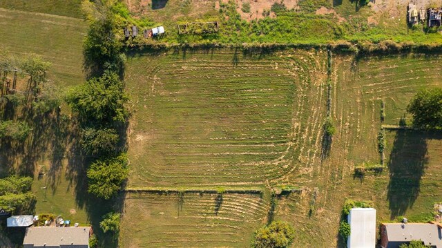 birds eye view of property featuring a rural view