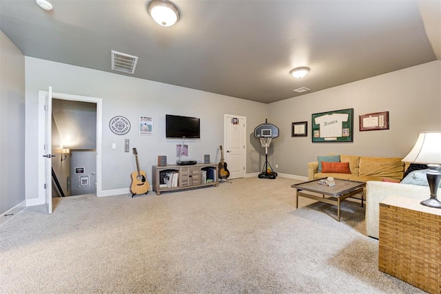 carpeted living room featuring baseboards and visible vents